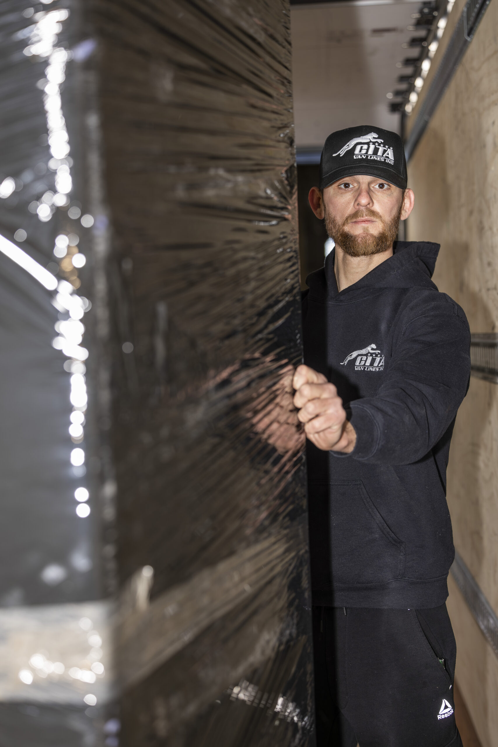 Movers carrying boxes